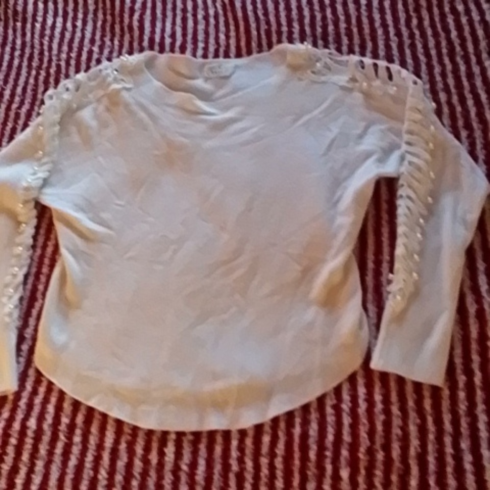 Women's detail cutout long sleeve sweater.